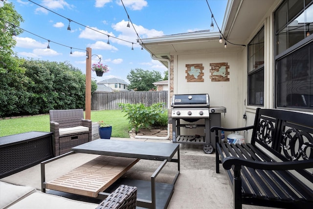 view of patio with grilling area and outdoor lounge area