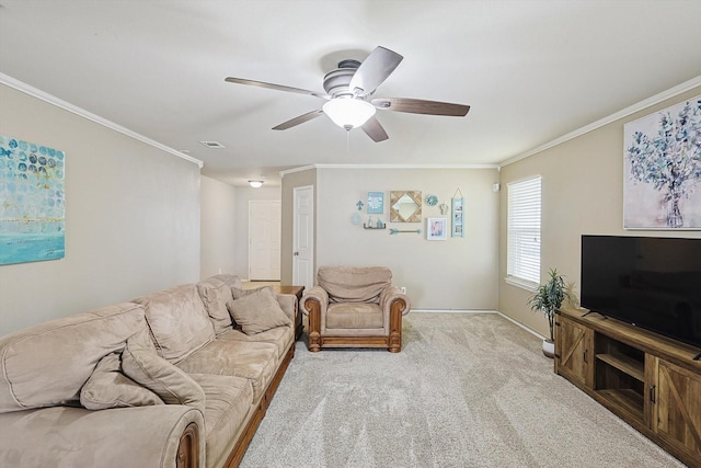 living room featuring ornamental molding, light colored carpet, and ceiling fan