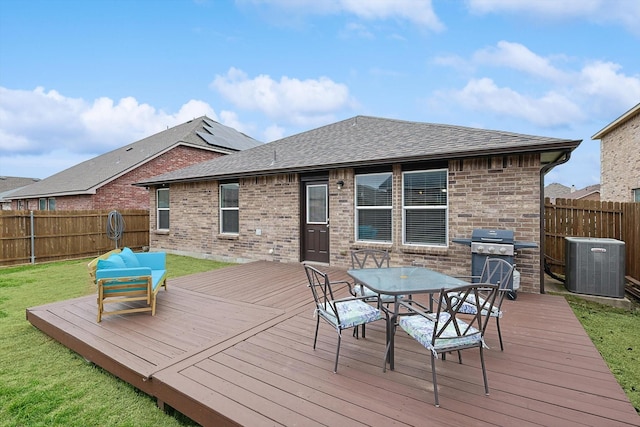 wooden deck featuring grilling area and central air condition unit