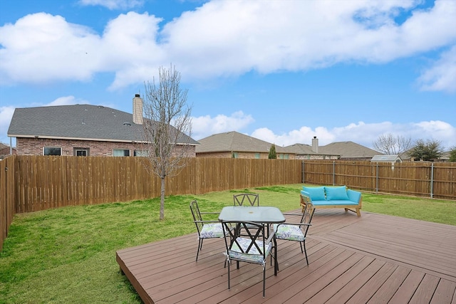 deck with an outdoor hangout area and a lawn