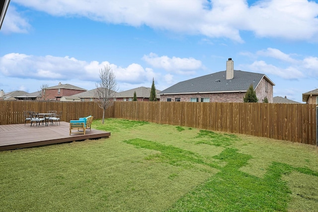 view of yard featuring a wooden deck