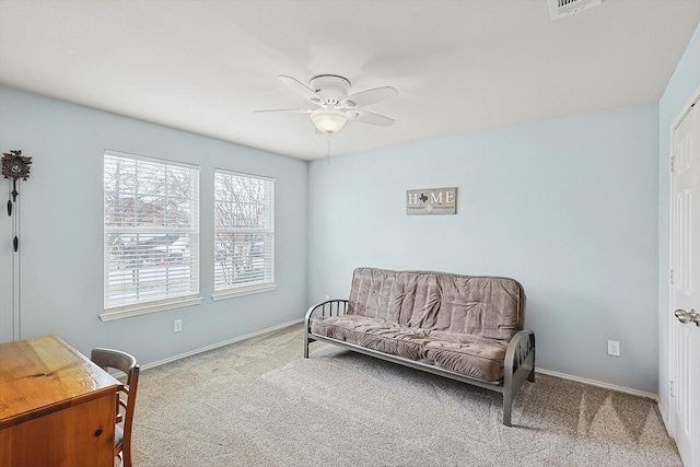 sitting room with carpet floors and ceiling fan