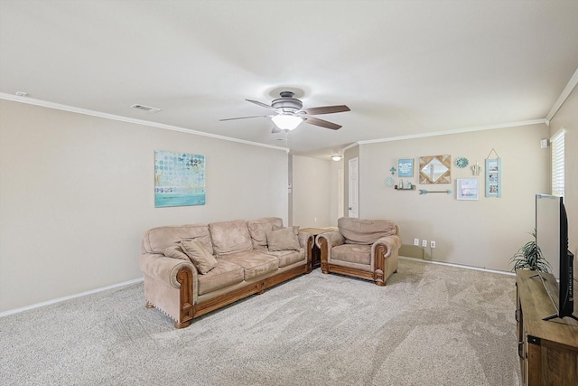 living room featuring ceiling fan, ornamental molding, and light carpet