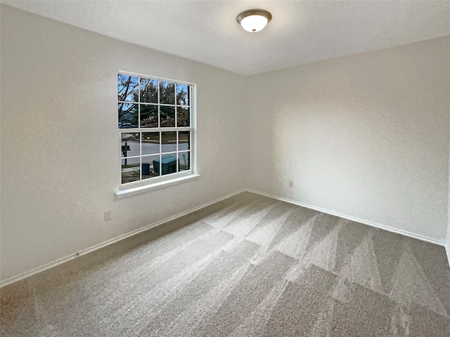 empty room with carpet floors