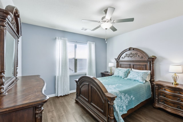 bedroom featuring hardwood / wood-style flooring and ceiling fan