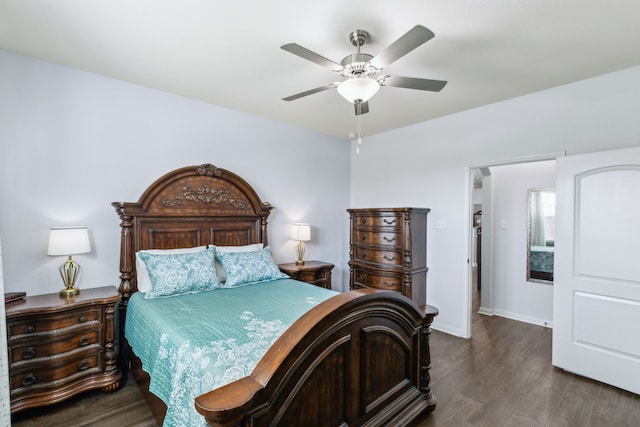 bedroom with dark wood-type flooring and ceiling fan