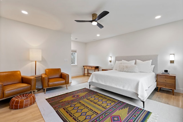 bedroom featuring ceiling fan and light hardwood / wood-style floors