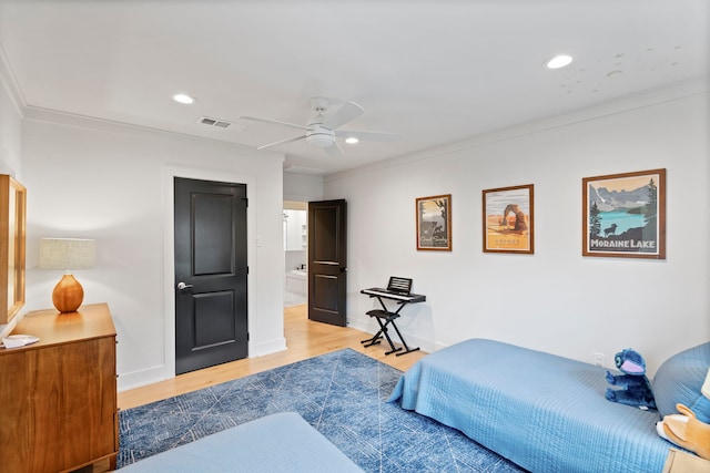 bedroom with ornamental molding, light hardwood / wood-style floors, and ceiling fan