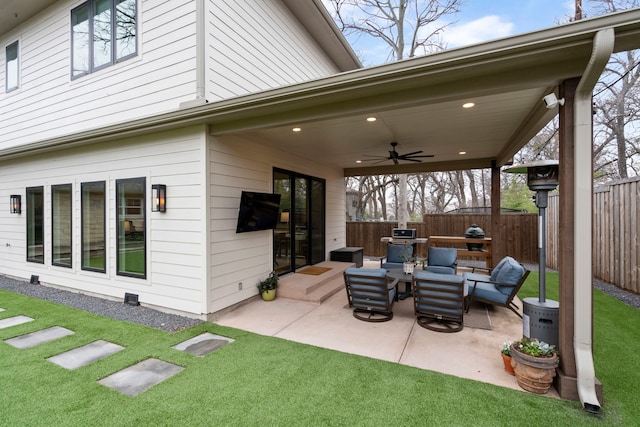 view of patio / terrace featuring ceiling fan and outdoor lounge area