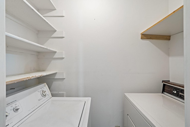 laundry room with washer / dryer