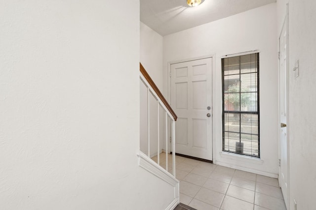 view of tiled entrance foyer