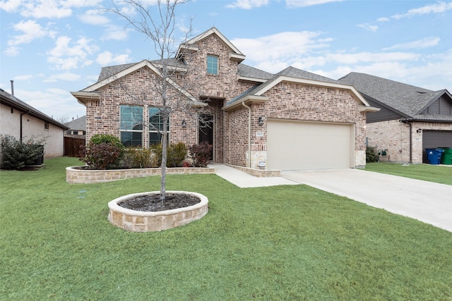 view of front of house featuring a garage and a front lawn