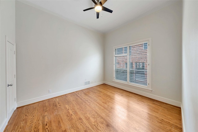 spare room featuring ceiling fan and light hardwood / wood-style floors