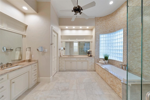 bathroom featuring crown molding, ceiling fan, vanity, and shower with separate bathtub