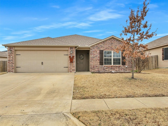 single story home featuring a garage and a front yard