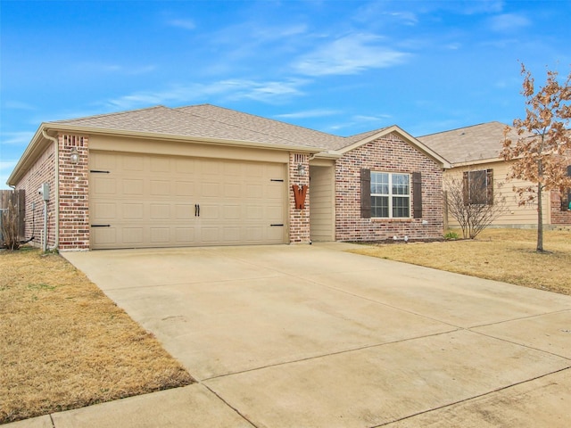 single story home with a garage and a front yard