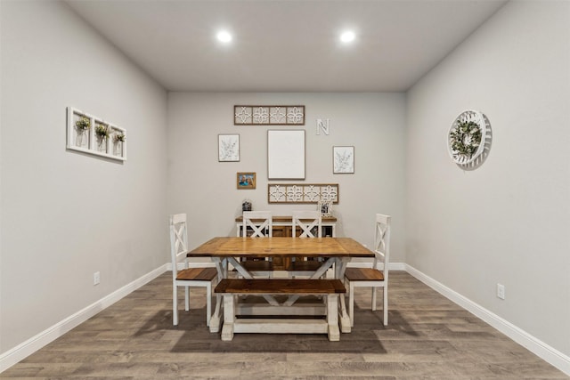 dining room featuring dark hardwood / wood-style flooring