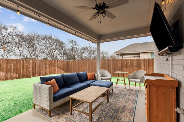 view of patio featuring an outdoor living space and ceiling fan