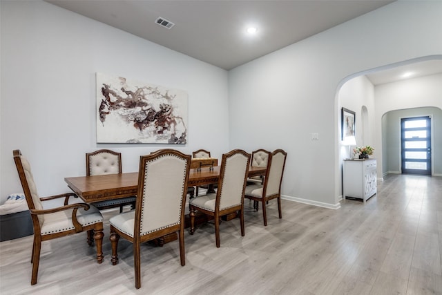 dining room with light wood-type flooring