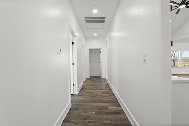 hallway with dark wood-type flooring