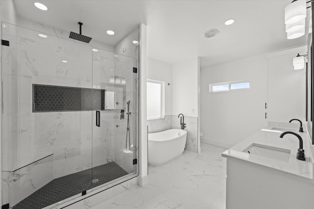 bathroom with vanity and plus walk in shower