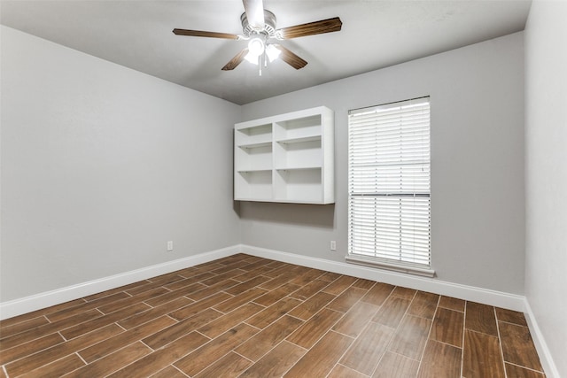 empty room featuring ceiling fan