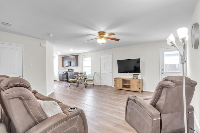 4322 Johnstown Ln, Forney, TX 75126 - living area with light wood-style flooring and ceiling fan