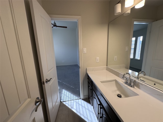 bathroom featuring vanity and ceiling fan