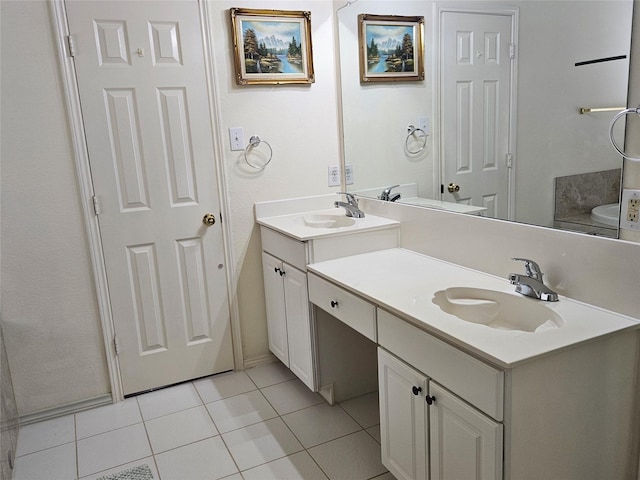 bathroom with vanity and tile patterned floors