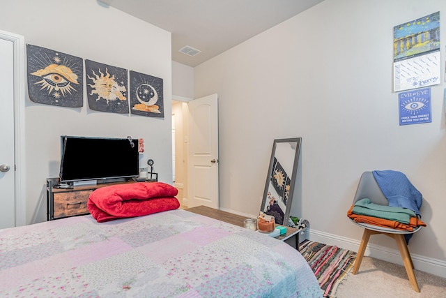 bedroom with lofted ceiling