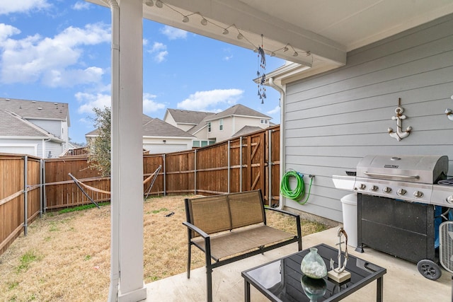 view of patio with grilling area and an outdoor living space