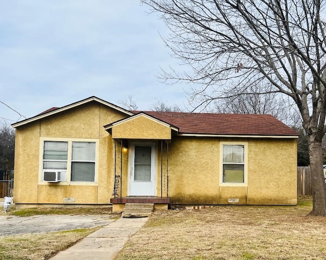 view of front facade featuring cooling unit