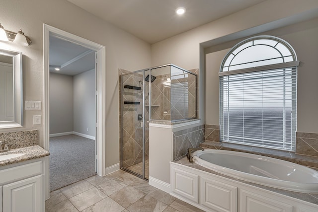 bathroom featuring vanity and plus walk in shower