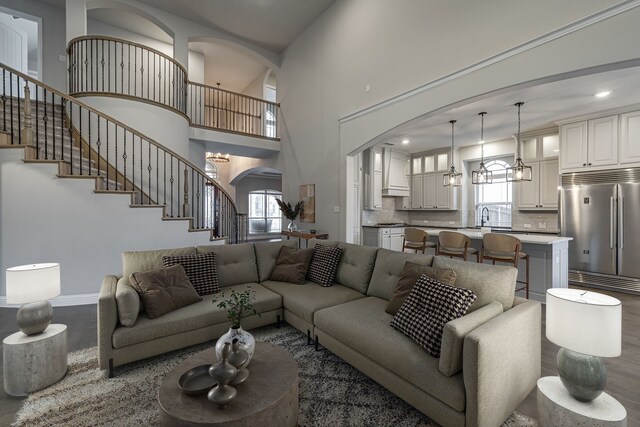 additional living space featuring lofted ceiling and light colored carpet