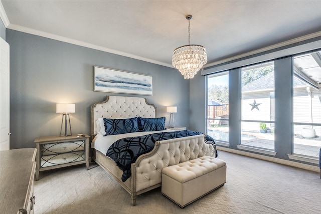 bedroom with crown molding, carpet flooring, and a notable chandelier