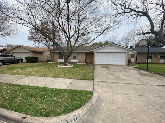 ranch-style house with a garage and a front lawn