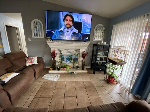 tiled living room with lofted ceiling