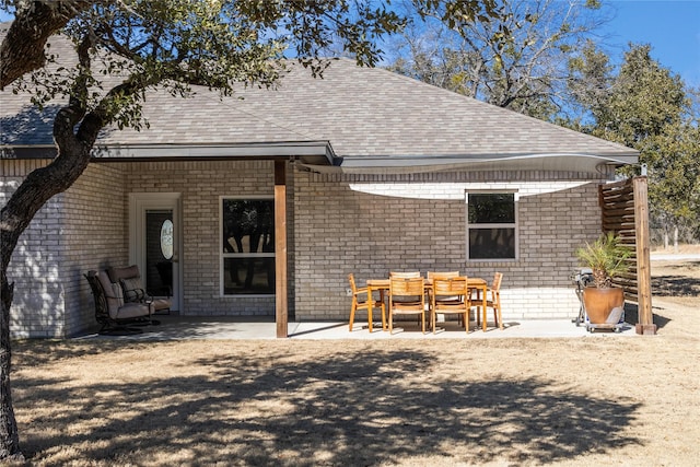 back of property featuring a patio area