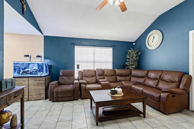 tiled living room featuring ceiling fan and lofted ceiling