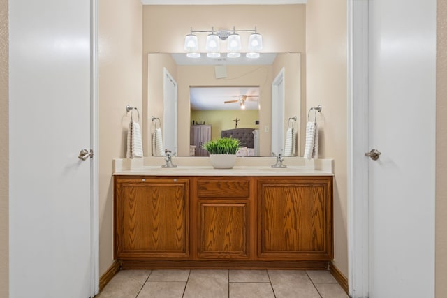 bathroom with vanity and tile patterned flooring