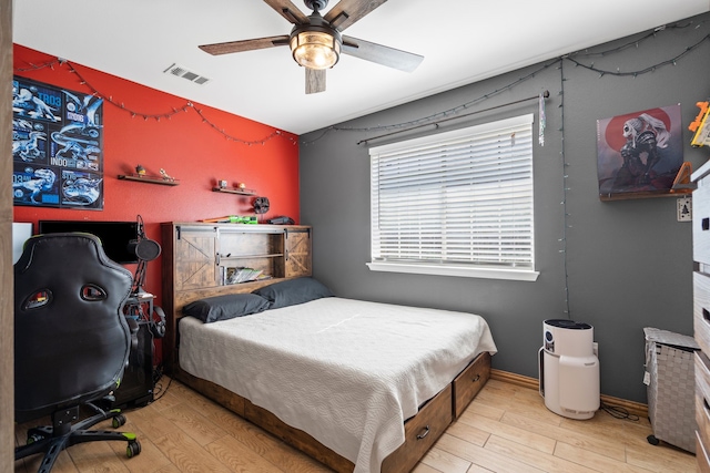 bedroom featuring ceiling fan and light wood-type flooring