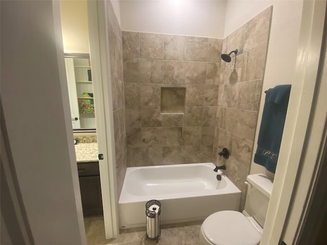 full bathroom featuring vanity, toilet, and tiled shower / bath combo