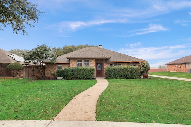 view of front of property with a front lawn