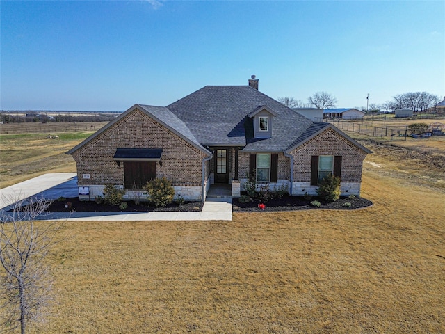 view of front of house featuring a front yard