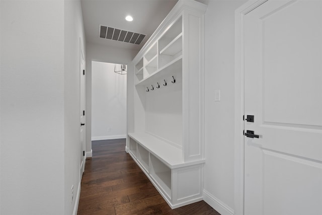 mudroom with dark hardwood / wood-style flooring