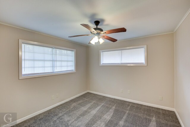 carpeted empty room featuring crown molding, ceiling fan, and french doors