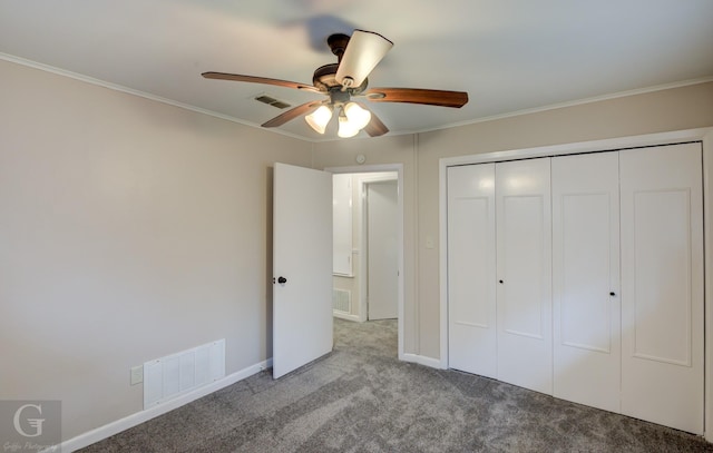 unfurnished bedroom featuring visible vents, ornamental molding, and light colored carpet