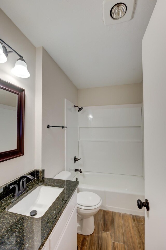 unfurnished bedroom featuring ceiling fan, connected bathroom, ornamental molding, light carpet, and a closet