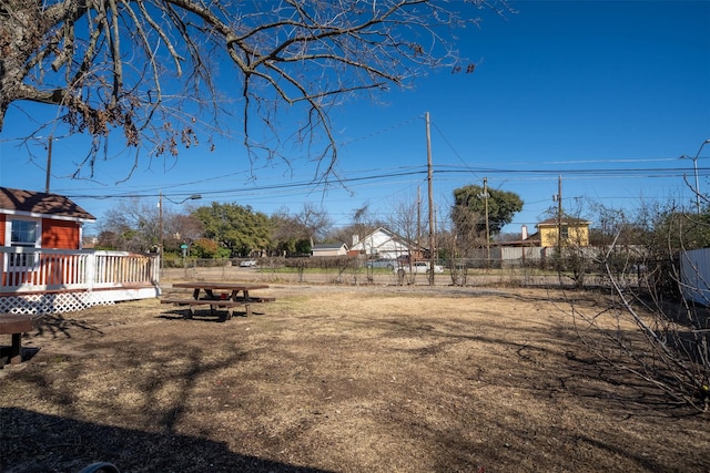 view of yard featuring a wooden deck