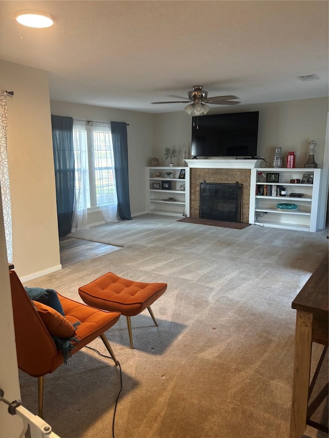 living room featuring ceiling fan and light carpet